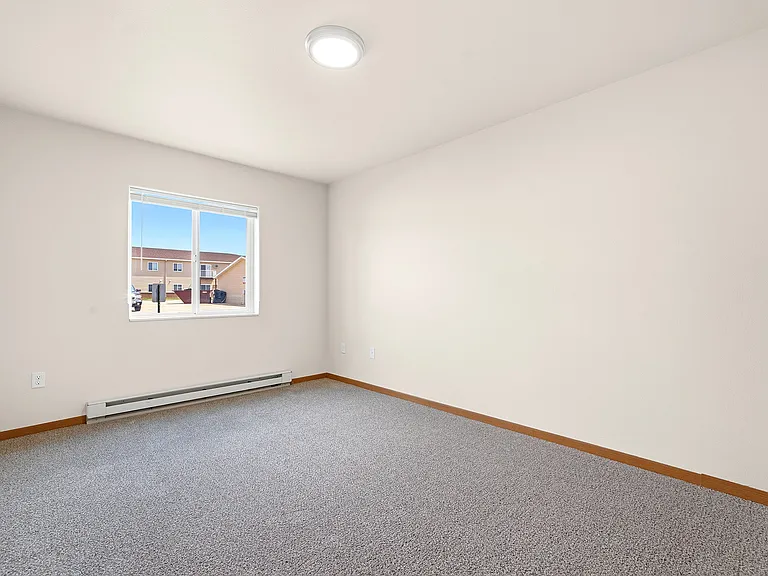 Step into the spacious interiors of Paramount at the Bluffs Apartments, where natural light enhances the welcoming ambiance. Enjoy modern living with thoughtful design elements. Schedule a visit today to see your new home in person.