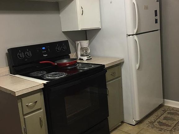 kitchen large enough for small table.