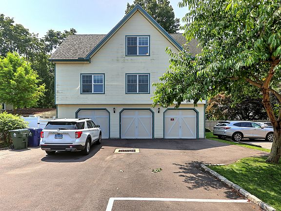 The "Carriage House" of 135-137 Gulf Street is a separate residence from the main building with 1 car garage.