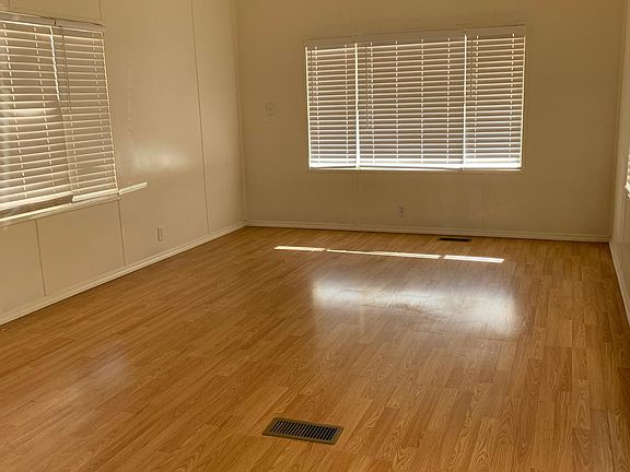 Open great room to kitchen, gorgeous flooring