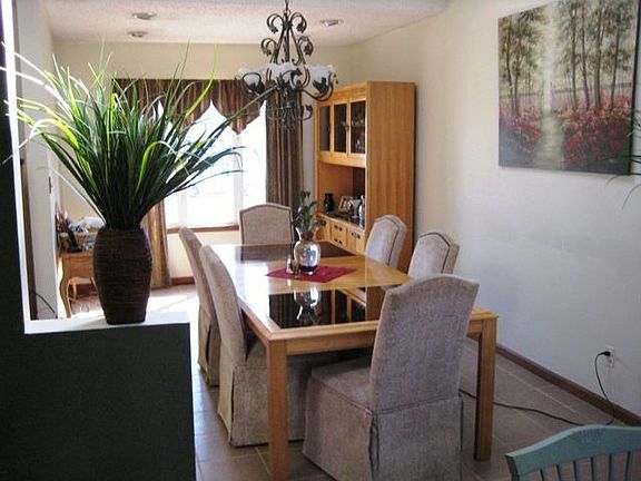 DINING ROOM W/CATHEDRAL CEILING & SKYLIGHT