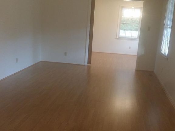 Formal living and dining nook with hardwoods