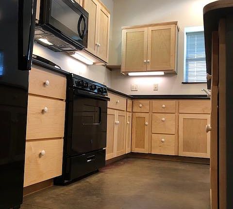 Kitchen cabinets with under the counter lighting. All lighting is on dimmers.