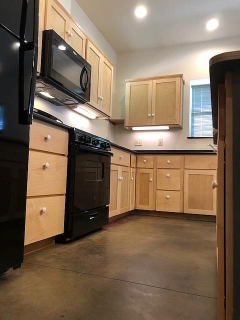 Kitchen cabinets with under the counter lighting. All lighting is on dimmers.