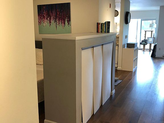 Expansive hallway the full length of the condo