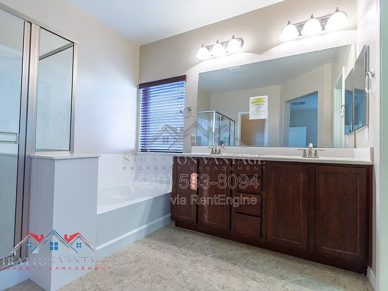 11751 W Daley Ln — Photo 34