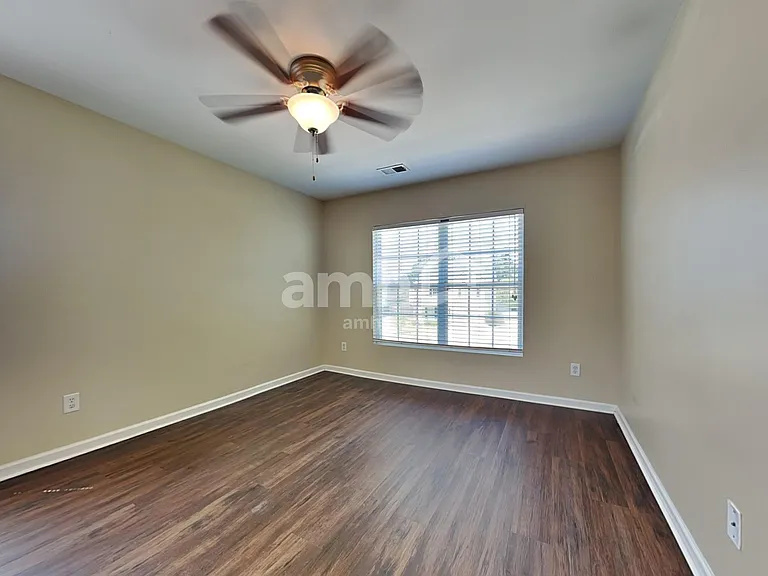 409 Lakewind Dr — Photo 9