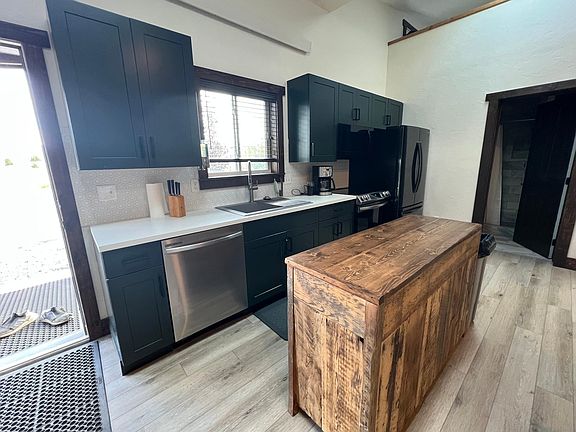 Kitchen is fully outfitted. It is ready to cook in.