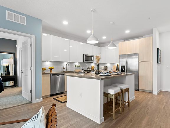 Welcoming Kitchen View with Kitchen Island