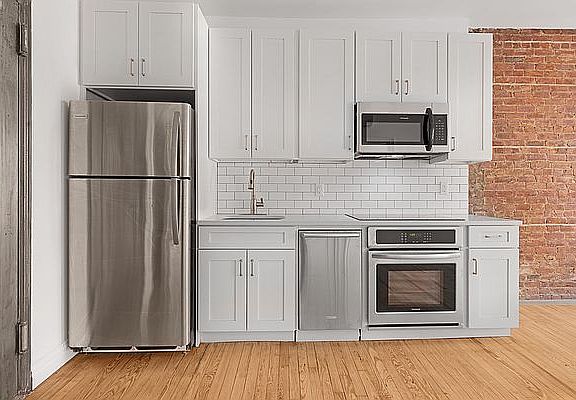 3rd image of 302 E 12th St APT 8
