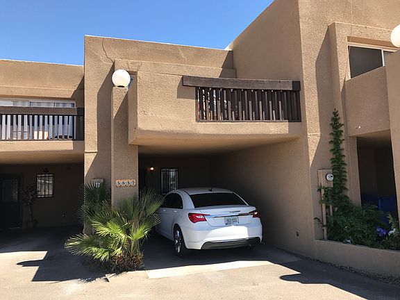 Front view of unit w/parking