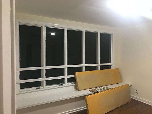 Large windows from the top floor of this two story unit
