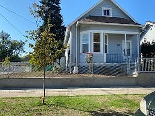 House is facing east. grass has been planted and there are bushes all around. I have a landscaper that takes care of the lawn every 2 weeks.