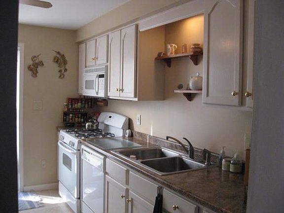renovated kitchen w/sliders to deck