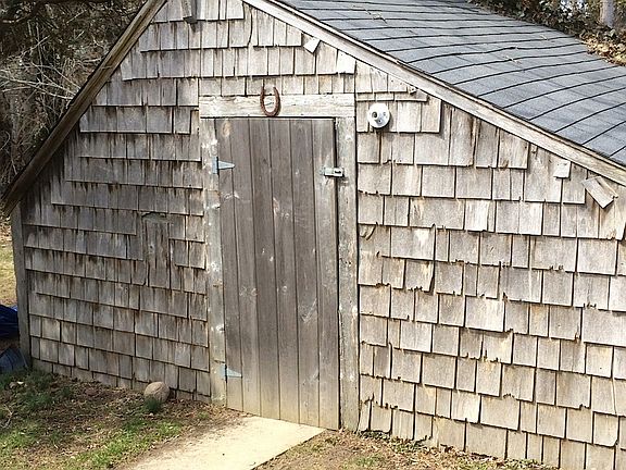 Outdoor Storage shed to keep your refuse.