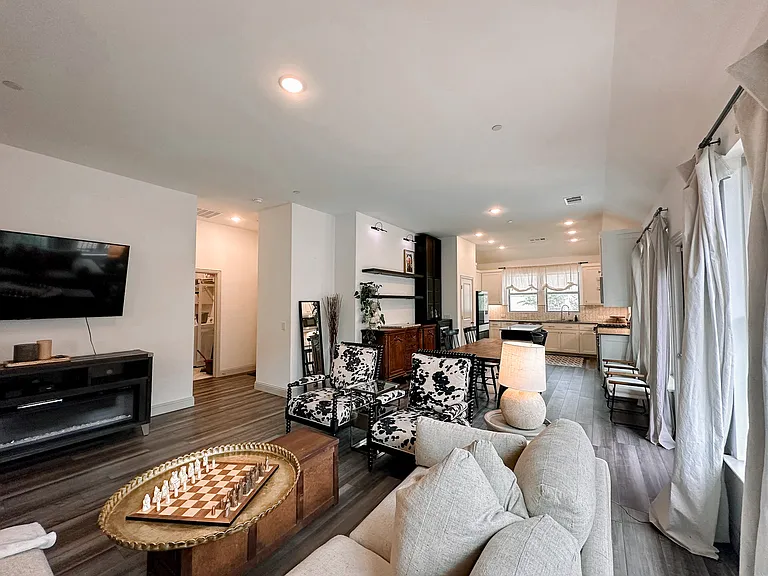 Living room featuring an open floorplan, perfect for entertaining