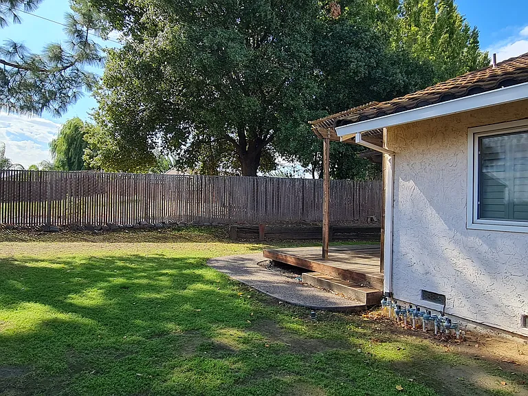 Huge lot and lots of yard space. Sprinklers installed