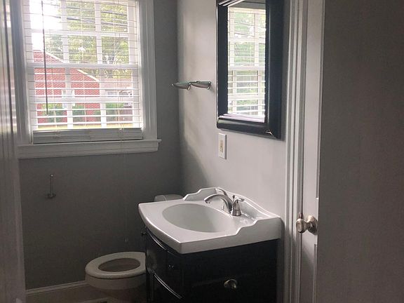 Shared full bath between bedrooms 2 & 3 with a nice sized linen closet and bath/shower combo