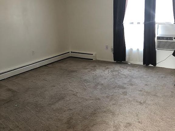 Living room with window air conditioner