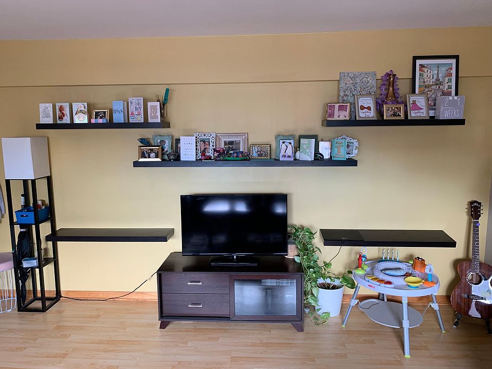 Living room with built in floating shelves