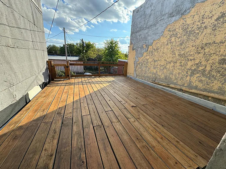 Here is the place to let all your worries disappear. The deck also has stairs off the back to allow you to park in the back. There is also a big raised bed garden. Many amazing evenings have been spent here admiring glorious sunsets on quiet evenings.