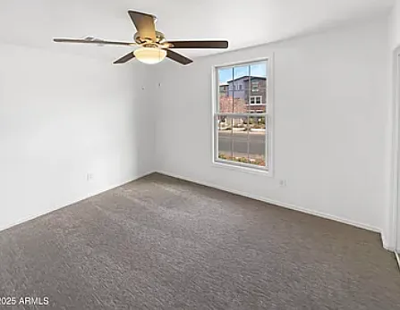 This is the room shown empty. New interior and exterior shades have been installed.