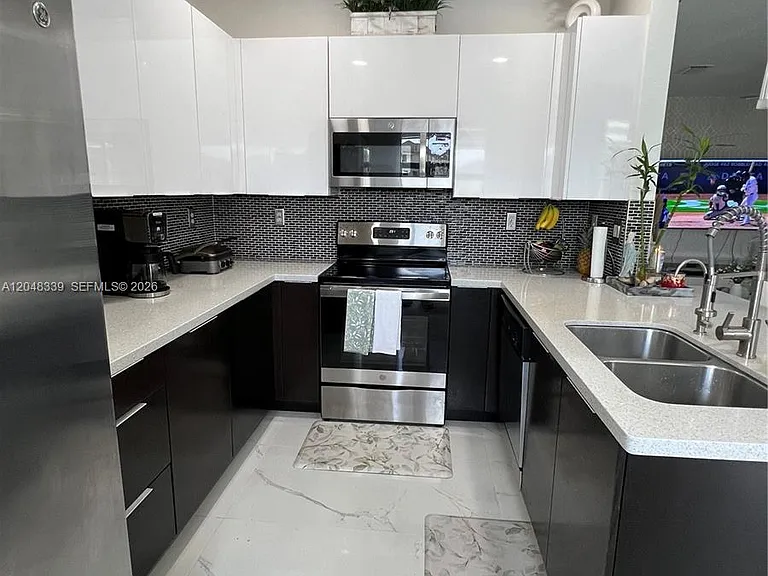 9336 W 34th Ct — Photo 10