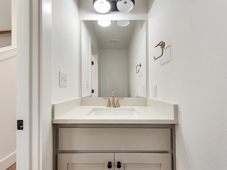 Half-bath on first floor.