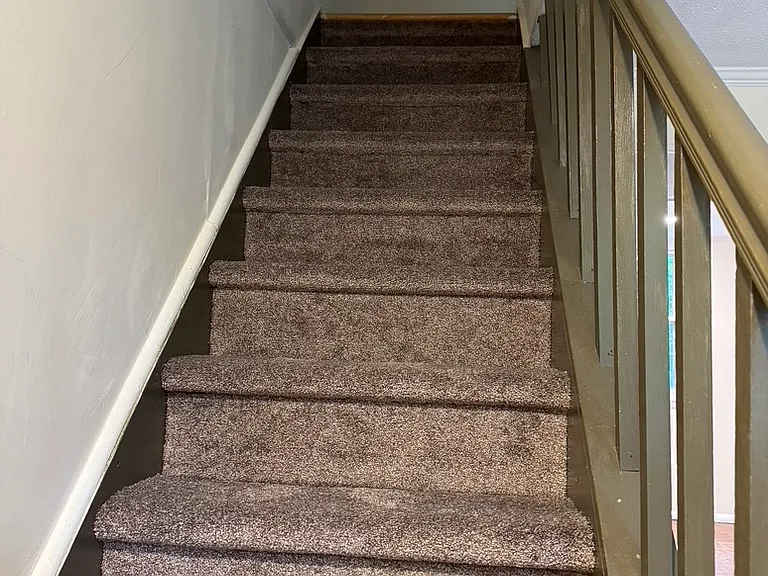 Newly carpeted stairs to upstairs.