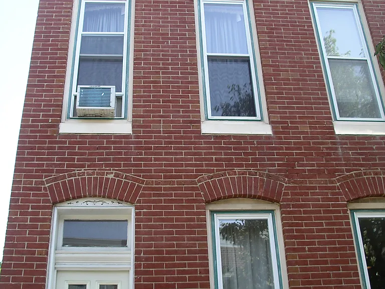 Front of building, unit is upstairs