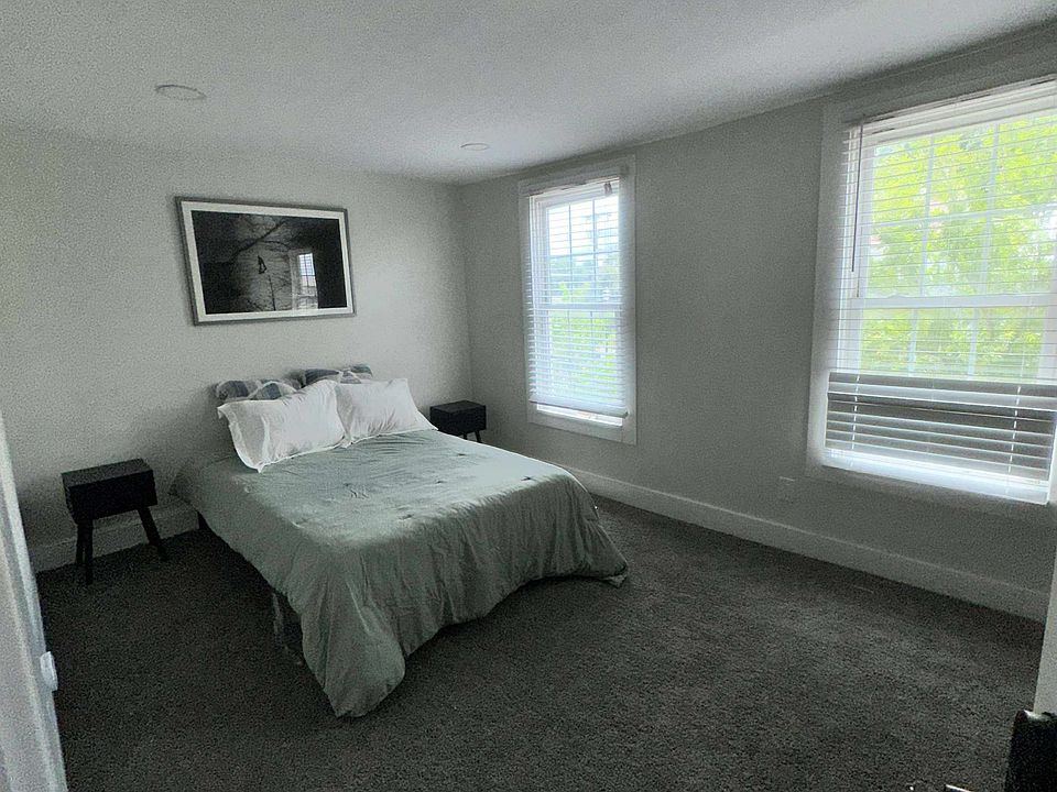 Master bedroom overlooking the hustle and bustle of Main Street Middletown. +BIG a walk-in closet