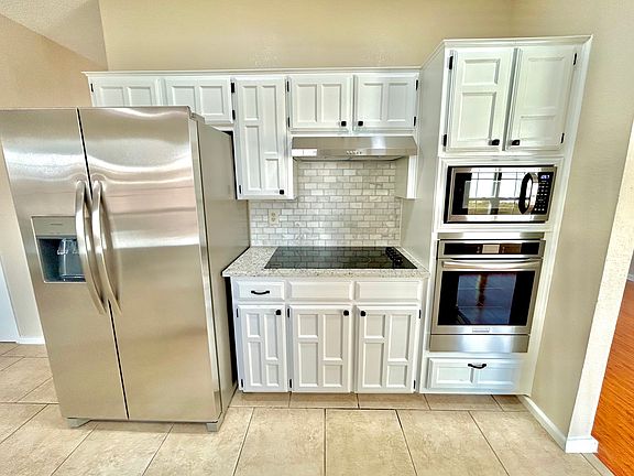 Kitchen, electric cook top, microwave, oven