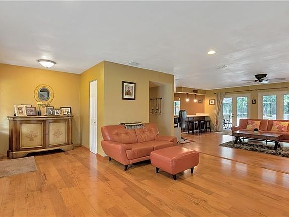 Living area off entry with wood floors