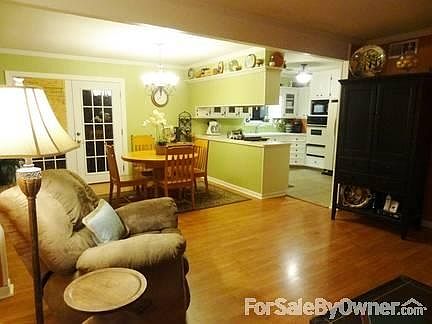 OPEN CONCEPT LIVING AREA
						:
						Open concept living area with a gas fireplace in the dining area