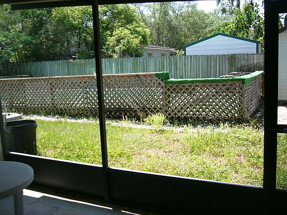 Back Lanai and fenced pool
