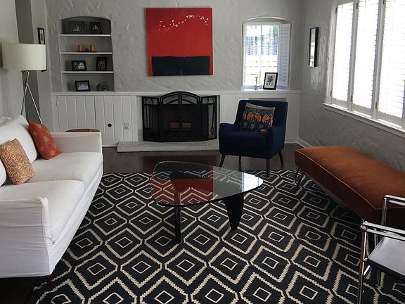 Spacious, formal living room overlooks the golf course.