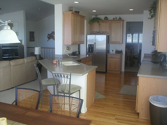 Beautiful Hardwoods and SS Appliances in Spacious Kitchen
