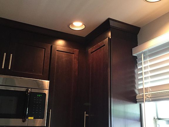 Custom Cabinetry and recessed lighting