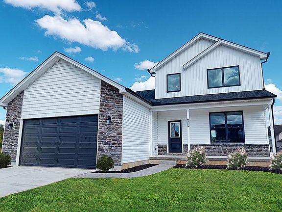 The Baybrook by Todd Homes Elevation C with Vertical Board amp Batten amp Stone Accents