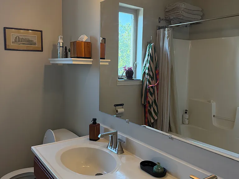 Full bath features double vanity