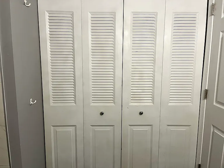 Upstairs shared bathroom - laundry closet
