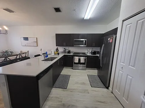 15520 SW 136th St #209 Photo 1