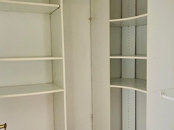 one of the closets in master bedroom