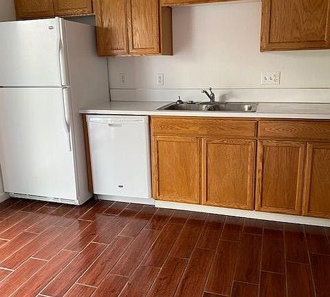 Kitchen, Sliding door is by refrigerator