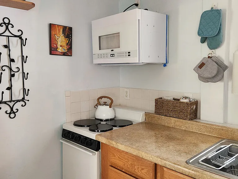 new stove and microwave--
pots and pans, dish soaps provided