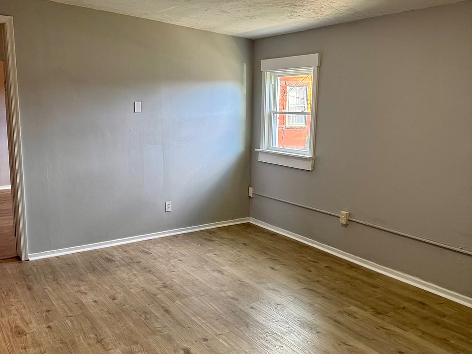 111 Baltimore St 2nd Fl. Rear - Dining Area (new LVP flooring & replacement windows)