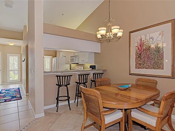 Dining area, breakfast bar, foyer and view to kitchen