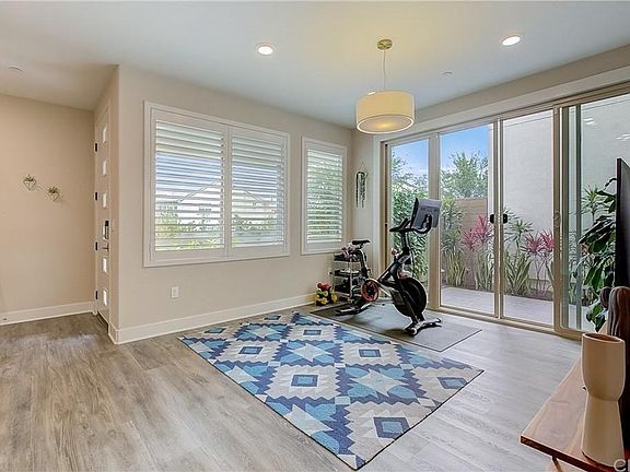 Versatile Living Space, Exercise room and sliding doors to patio