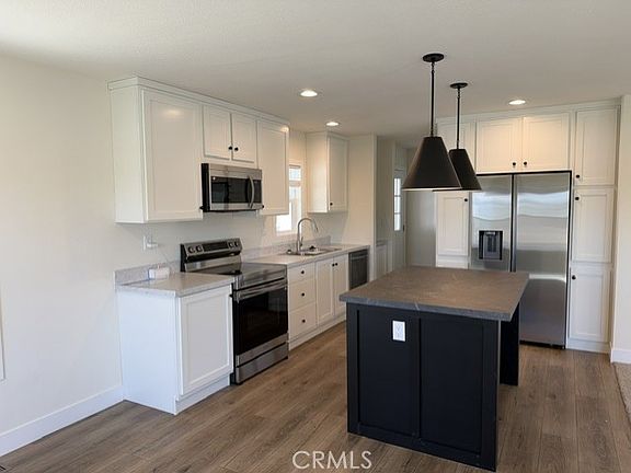 3rd image of 3444 Center St #65