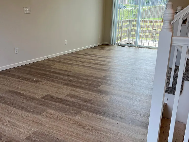 open concept vaulted ceilings main floor living/ dining